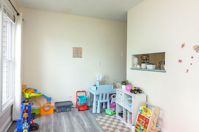 240 Algonquin Ct Unit A, Bolingbrook, IL 60440 - game room with healthy amount of natural light and wood finished floors