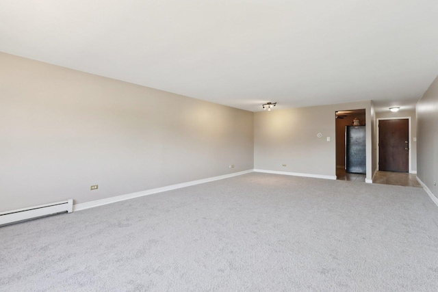 1320A Lore Ln Unit 204, Lombard, IL 60148 - spare room featuring light carpet and baseboard heating