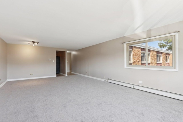 1320A Lore Ln Unit 204, Lombard, IL 60148 - carpeted spare room featuring a baseboard radiator and baseboards