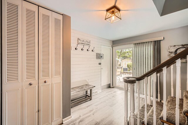 905 Harrison Ln, Hoffman Estates, IL 60192 - entryway with light wood finished floors and stairway