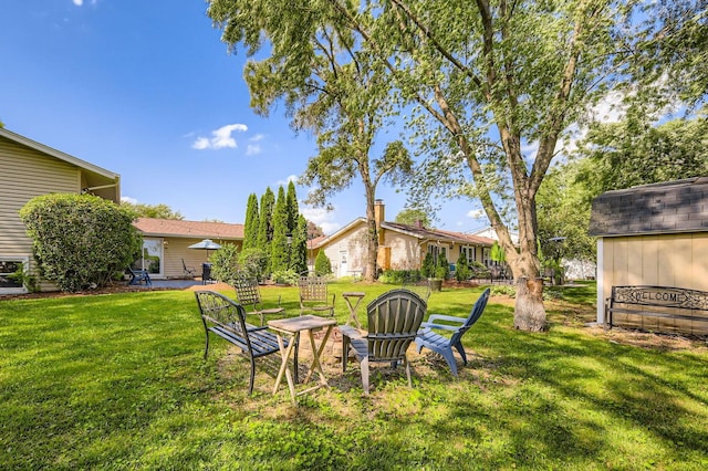 905 Harrison Ln, Hoffman Estates, IL 60192 - view of green lawn featuring an outbuilding