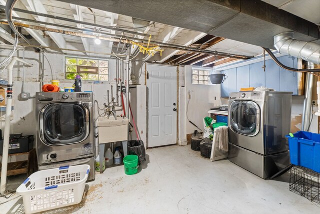10341 Canterbury St, Westchester, IL 60154 - laundry room with washer and clothes dryer and plenty of natural light