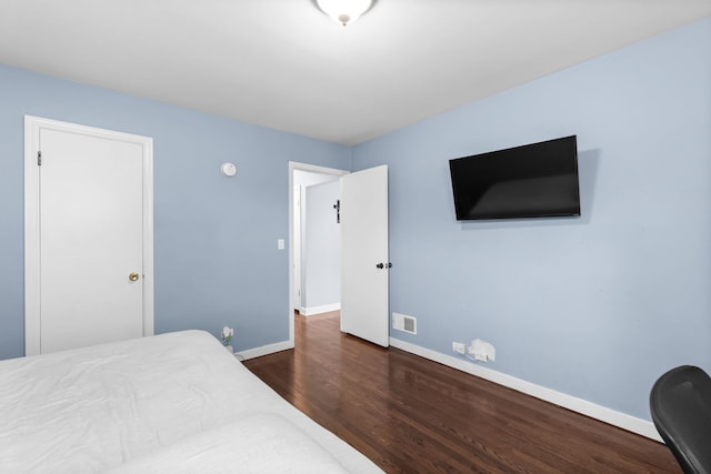 10341 Canterbury St, Westchester, IL 60154 - bedroom featuring dark wood finished floors and baseboards