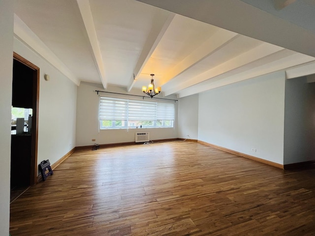 1950 W Hood Ave Unit 4C, Chicago, IL 60660 - empty room featuring a chandelier, beamed ceiling, wood finished floors, and a wall mounted air conditioner