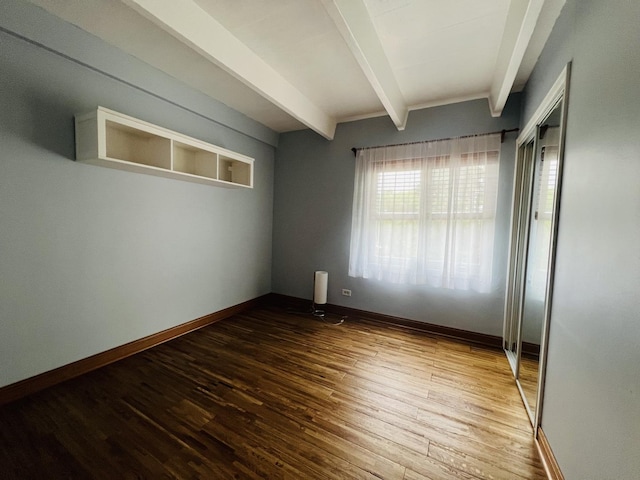 1950 W Hood Ave Unit 4C, Chicago, IL 60660 - empty room with beamed ceiling and wood finished floors