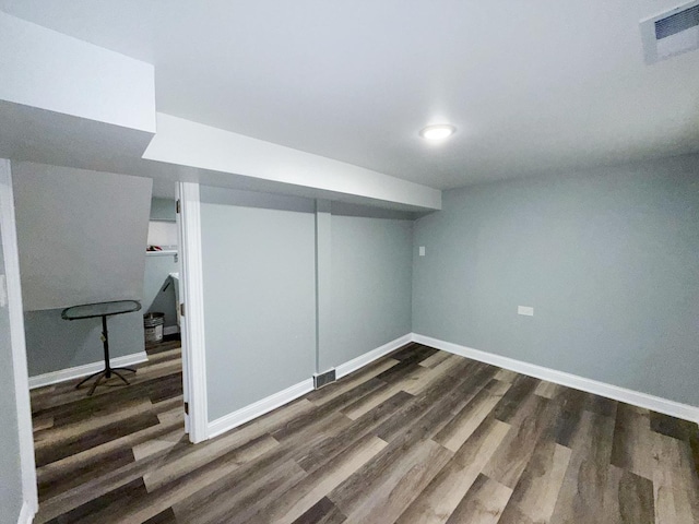 7252 S Wood St, Chicago, IL 60636 - finished below grade area with dark wood finished floors and baseboards