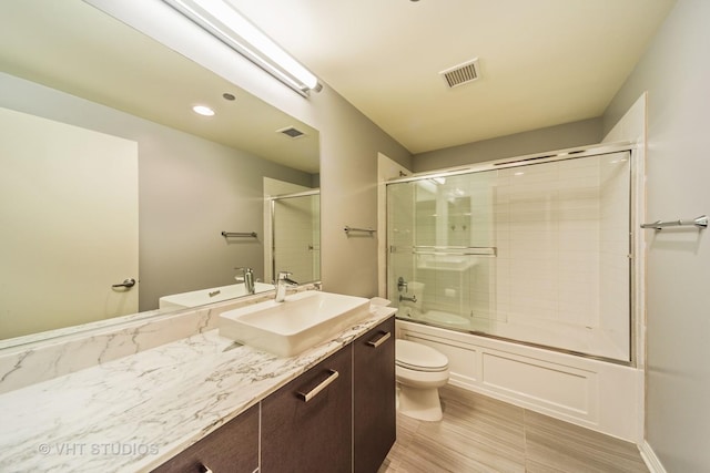 65 E Monroe St Unit 4010, Chicago, IL 60603 - full bath with vanity, shower / bath combination with glass door, and recessed lighting