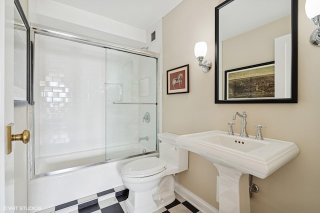 1250 N Dearborn St Unit 16B, Chicago, IL 60610 - bathroom featuring toilet and shower / bath combination with glass door