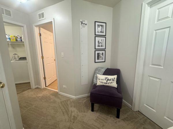 475 Lancaster Dr, Pingree Grove, IL 60140 - sitting room with carpet floors and washer / clothes dryer