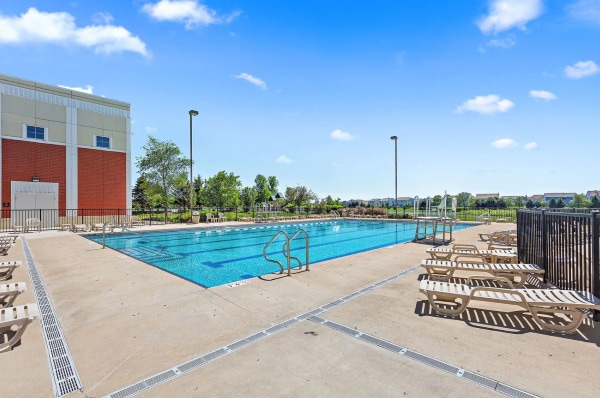 475 Lancaster Dr, Pingree Grove, IL 60140 - community pool with a patio area