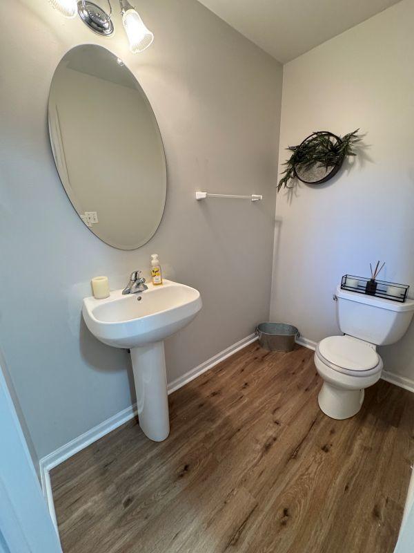 475 Lancaster Dr, Pingree Grove, IL 60140 - half bath featuring wood finished floors and toilet