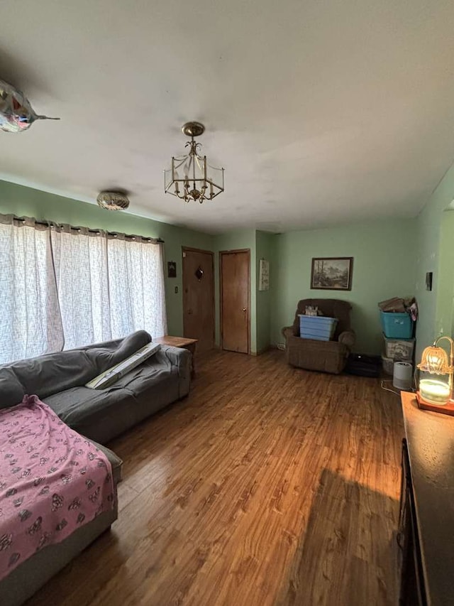 6709 W 59th St, Chicago, IL 60638 - living room with wood finished floors and a chandelier
