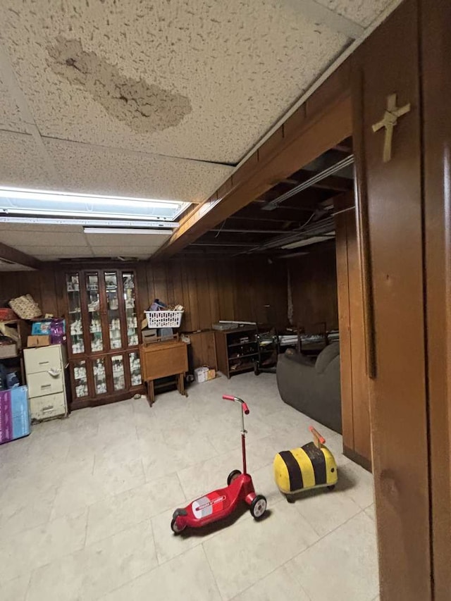 6709 W 59th St, Chicago, IL 60638 - finished below grade area featuring wooden walls and tile patterned flooring