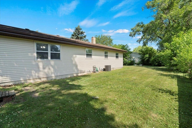 1514 N N Ave, Mchenry, IL 60050 - view of side of home with a yard and a cooling unit