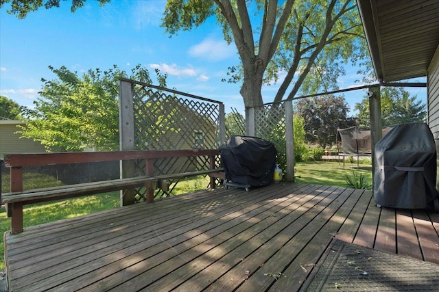 1514 N N Ave, Mchenry, IL 60050 - wooden terrace with grilling area and a trampoline