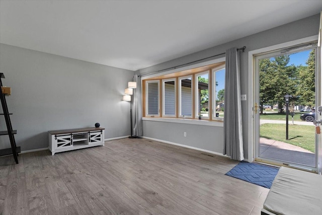 1514 N N Ave, Mchenry, IL 60050 - unfurnished living room featuring wood finished floors