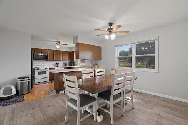 1514 N N Ave, Mchenry, IL 60050 - dining space with a ceiling fan and light wood-type flooring