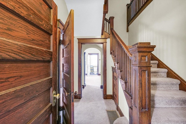 301 N Main St, Fithian, IL 61844 - stairs featuring carpet and arched walkways