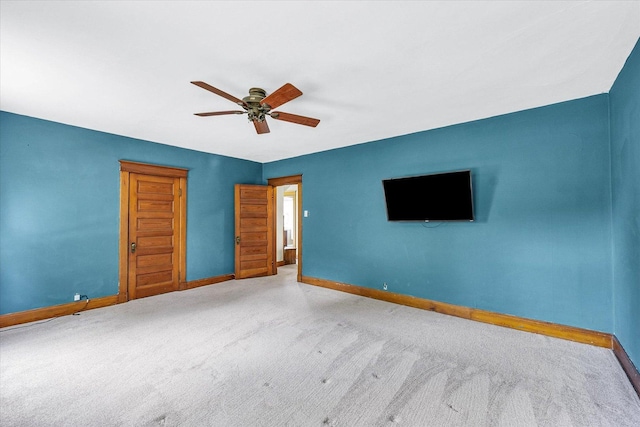 301 N Main St, Fithian, IL 61844 - unfurnished bedroom with carpet floors and ceiling fan