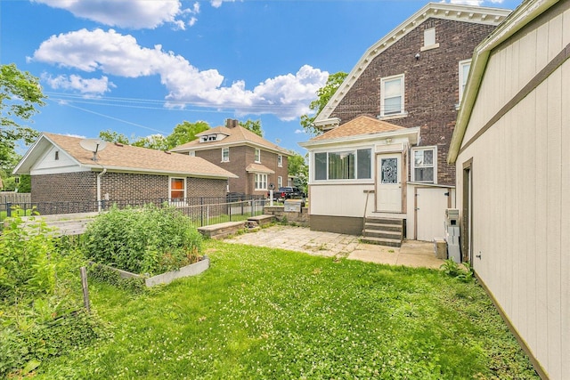 301 N Main St, Fithian, IL 61844 - view of yard featuring entry steps and a vegetable garden