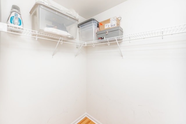 1070 W 15th St Unit 105, Chicago, IL 60608 - walk in closet featuring wood finished floors