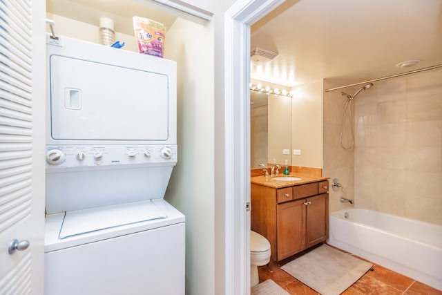 1070 W 15th St Unit 105, Chicago, IL 60608 - full bathroom featuring estacked washer and dryer, tile patterned floors, bathtub / shower combination, and vanity