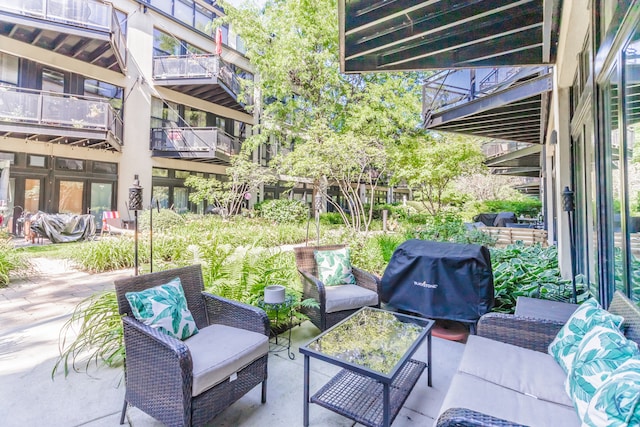 1070 W 15th St Unit 105, Chicago, IL 60608 - view of patio featuring outdoor lounge area and area for grilling