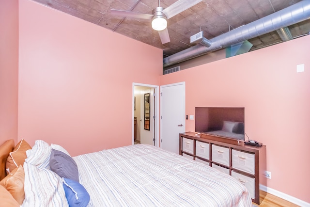 1070 W 15th St Unit 105, Chicago, IL 60608 - bedroom with wood finished floors and ceiling fan