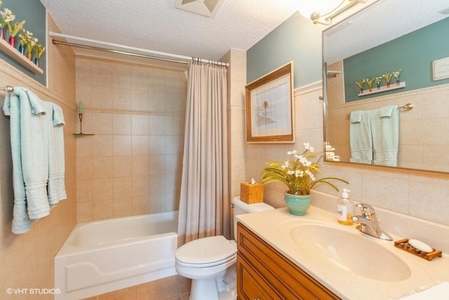 511 Aurora Ave Unit 405, Naperville, IL 60540 - bathroom with vanity, shower / bath combination with curtain, tile walls, a textured ceiling, and tile patterned flooring