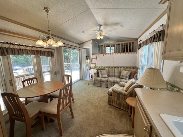 268 Fossil Bay Ct, Wilmington, IL 60481 - dining area featuring a textured ceiling, crown molding, ceiling fan, carpet flooring, and lofted ceiling