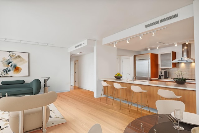 340 E Randolph St Unit 803, Chicago, IL 60601 - living area featuring rail lighting and light wood finished floors