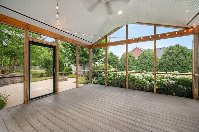 619 Northgate Dr, Sycamore, IL 60178 - unfurnished sunroom featuring vaulted ceiling and a ceiling fan