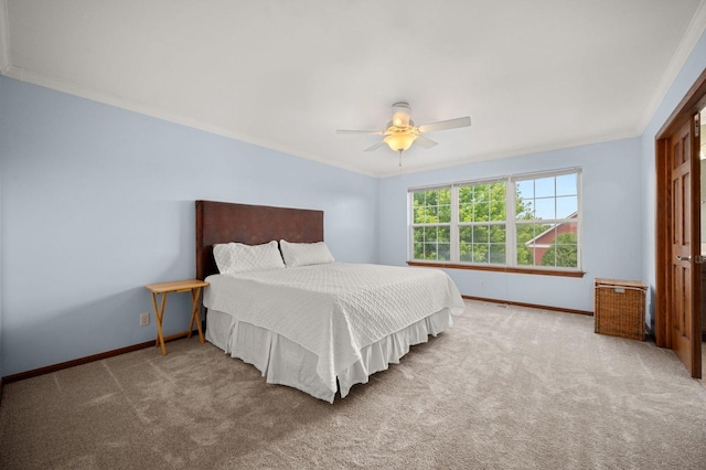 619 Northgate Dr, Sycamore, IL 60178 - carpeted bedroom with ornamental molding and a ceiling fan