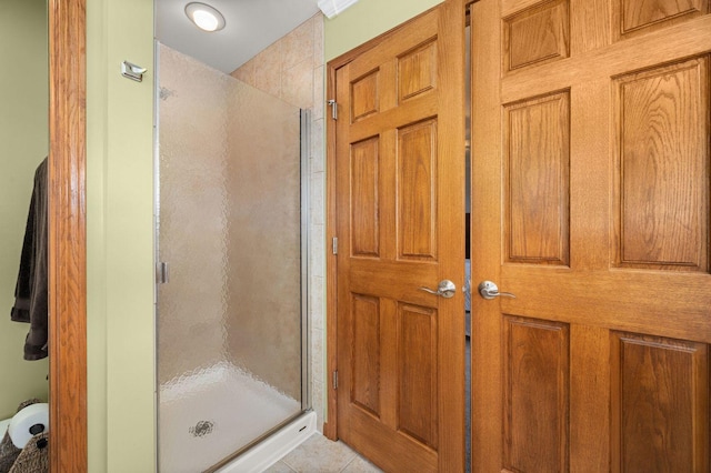 619 Northgate Dr, Sycamore, IL 60178 - full bath featuring a stall shower and tile patterned flooring