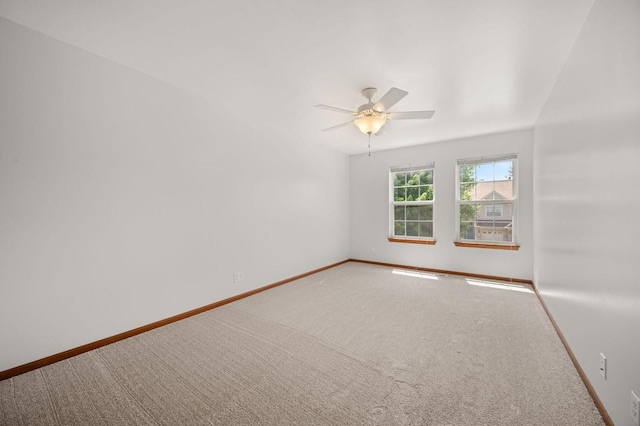 619 Northgate Dr, Sycamore, IL 60178 - carpeted empty room with baseboards and ceiling fan