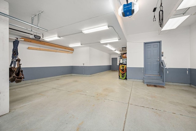 619 Northgate Dr, Sycamore, IL 60178 - garage featuring a garage door opener