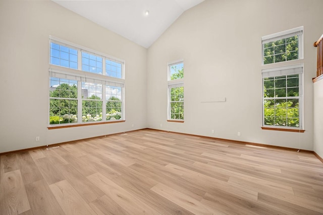 619 Northgate Dr, Sycamore, IL 60178 - unfurnished room with high vaulted ceiling and light wood finished floors