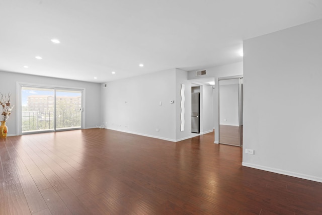 4900 Foster St Unit 410, Skokie, IL 60077 - unfurnished living room with wood finished floors and recessed lighting