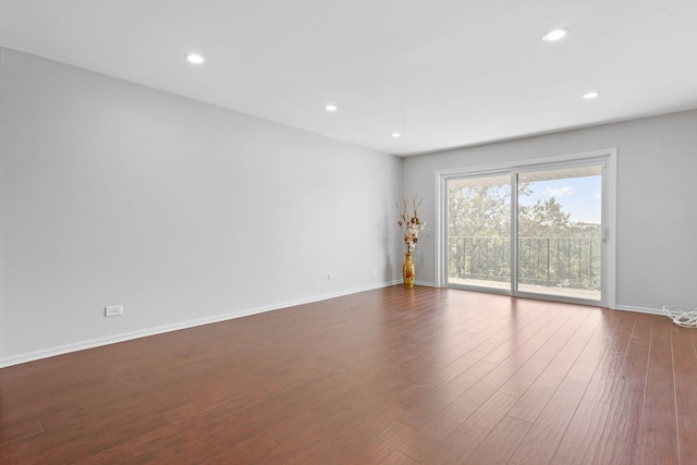 4900 Foster St Unit 410, Skokie, IL 60077 - empty room with dark wood-type flooring and recessed lighting