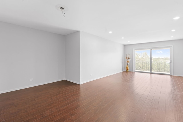 4900 Foster St Unit 410, Skokie, IL 60077 - unfurnished room with recessed lighting and dark wood-type flooring