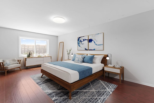 4900 Foster St Unit 410, Skokie, IL 60077 - bedroom featuring wood-type flooring and baseboards