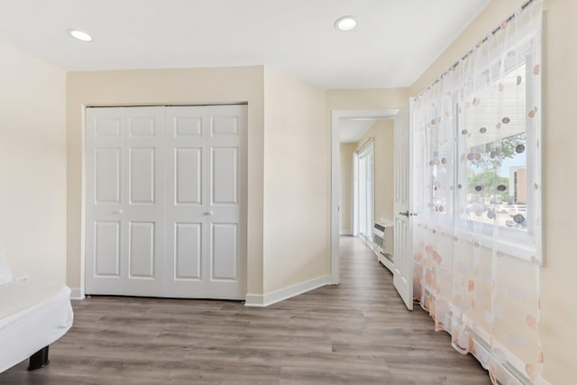9250 Noel Ave Unit 205E, Des Plaines, IL 60016 - hallway with light wood finished floors and recessed lighting
