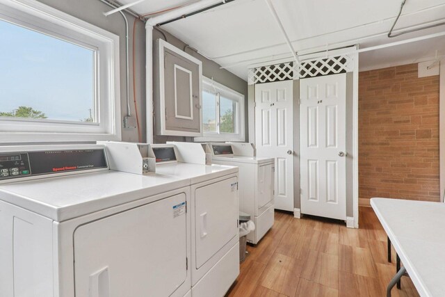 9250 Noel Ave Unit 205E, Des Plaines, IL 60016 - shared laundry featuring washer and dryer and light wood finished floors