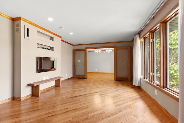7637 Sequoia Ct, Orland Park, IL 60462 - unfurnished living room featuring a chandelier, light wood finished floors, crown molding, and recessed lighting