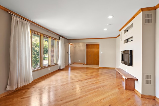 7637 Sequoia Ct, Orland Park, IL 60462 - unfurnished living room with light wood-type flooring, crown molding, and recessed lighting