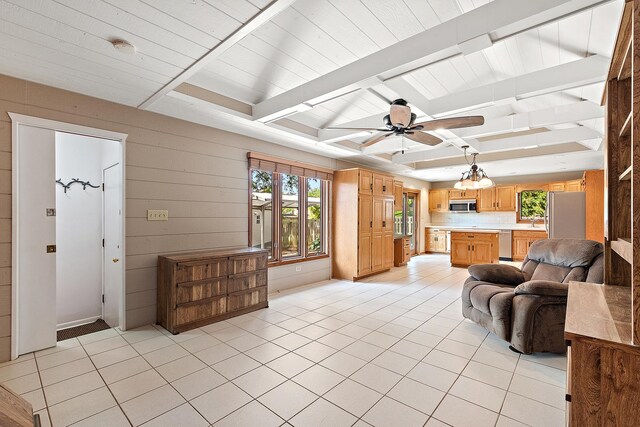 7637 Sequoia Ct, Orland Park, IL 60462 - living room with light tile patterned floors, ceiling fan, and beamed ceiling