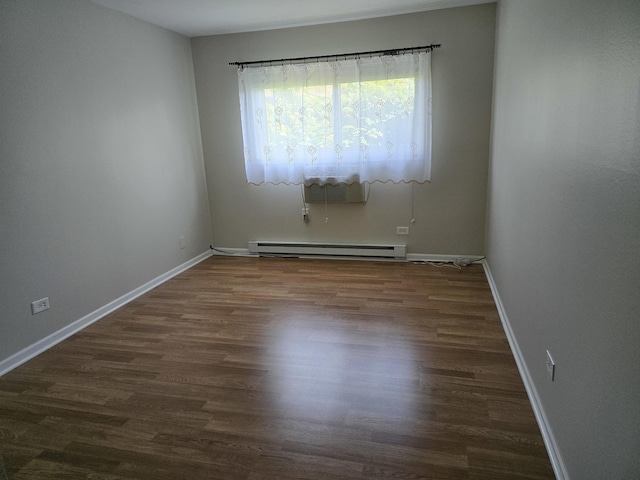 836 E Old Willow Rd Unit 109, Prospect Heights, IL 60070 - empty room featuring baseboard heating, wood finished floors, and an AC wall unit