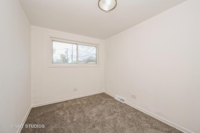 1147 E 91st St, Chicago, IL 60638 - carpeted empty room with baseboards