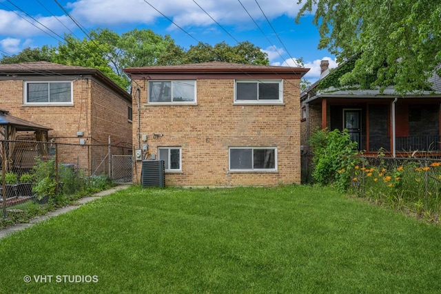 1147 E 91st St, Chicago, IL 60638 - rear view of house with brick siding, a gazebo, and a gate