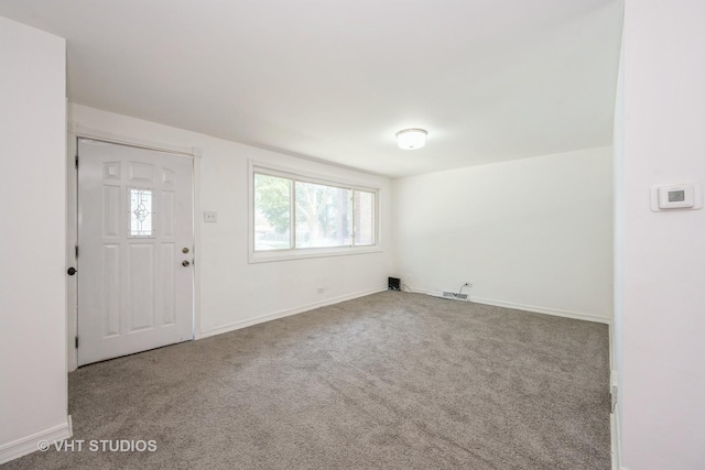 1147 E 91st St, Chicago, IL 60638 - foyer entrance with plenty of natural light and carpet floors
